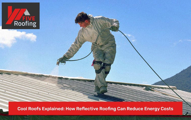 Worker applying cool roof reflective coating with a spraying tool.