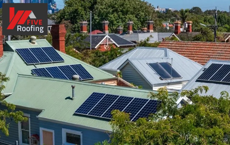 Row of houses featuring solar panels on their roofs for energy efficiency.